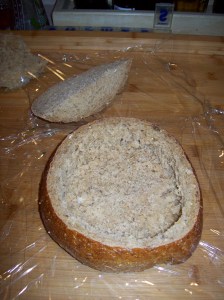 Cut top third of bread off and remove all leaving 1/2" cust