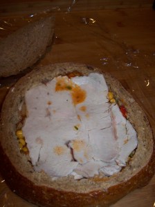 layer with 1/3 corn salad, then 1/3 turkey then cheese continue finishing with corn salad