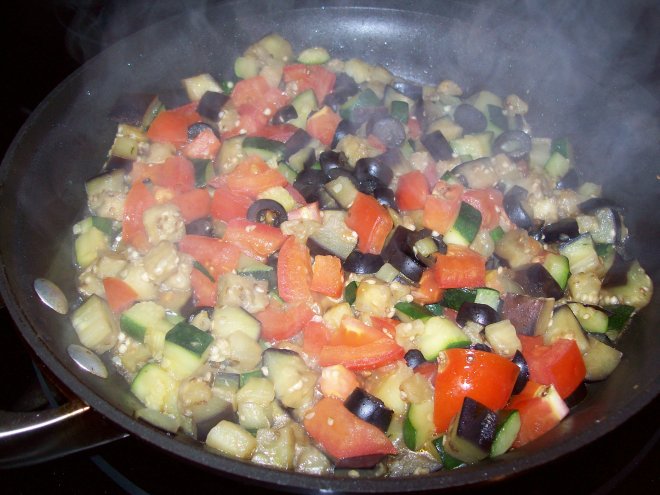 add tomatoes and olives